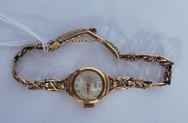 A vintage 20th Century ladies Medana Lever 17 jewels 9ct gold cocktail watch having a silvered
