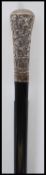 A late 19th Century / 20th Century Victorian promenade walking stick cane having a silver knop
