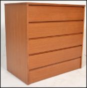 A 1960's retro vintage teak wood chest of drawers of simple form having a straight run of four