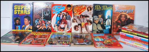 A collection of vintage retro children's annuals to include Asterix, Dempsey and Makepeace, Grange