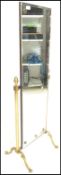 A mid 20th Century brass framed full size Cheval dressing bedroom mirror, raised on reeded column