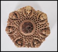 A 20th Century craved soapstone inkwell of heptago