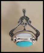 A sterling silver and marcasite Art Nouveau style