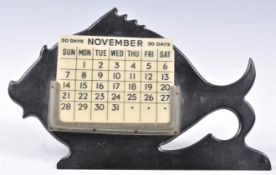 ART DECO BAKELITE DESKTOP CALENDAR IN THE FORM OF A FISH