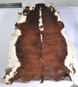 VINTAGE 1970'S COW HIDE FLOOR RUG