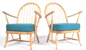 A PAIR OF ERCOL 1950'S LOW WINDSOR CHAIRS BY LUCIAN EROLANI