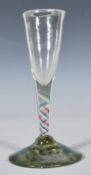 18TH CENTURY GLASS DRINKING GLASS WITH COLOURED STEM AND FOOT