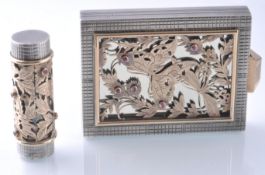 A 1940'S BOUCHERON PARIS GOLD, SILVER AND RUBY COMPACT AND LIPSTICK SUITE