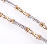 A 9CT WHITE AND YELLOW GOLD CONTEMPORARY BOOK CHAIN NECKLACE