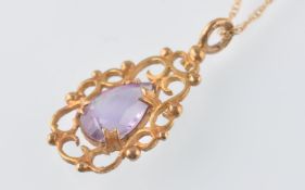 9CT GOLD AMETHYST PENDANT AND 15CT GOLD CHAIN