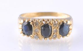 18CT GOLD SAPPHIRE AND DIAMOND RING