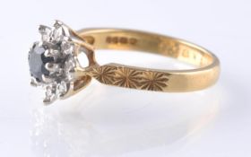 18CT GOLD SAPPHIRE AND DIAMOND CLUSTER RING - LONDON HALLMARKED
