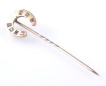 9CT GOLD RUBY AND DIAMOND HORSE SHOE STICK PIN