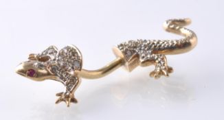 A HALLMARKED 9CT GOLD GEM SET BELLY BUTTON BAR