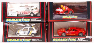COLLECTION OF BOXED SCALEXTRIC SLOT CAR RACING MODELS