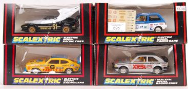 COLLECTION OF BOXED SCALEXTRIC SLOT CAR RACING MODELS