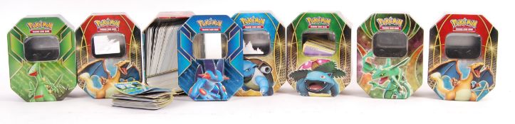 COLLECTION OF ASSORTED POKEMON CARDS AND TINS