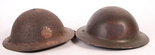 TWO WWII SECOND WORLD WAR STEEL BRODIE HELMETS
