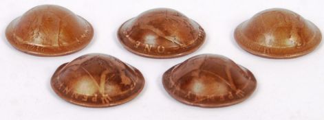 SET OF FIVE PENNIES FROM WWI MADE INTO BRODIE HELM