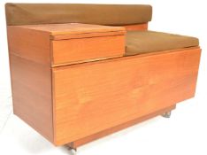 A retro mid 20th Century teak wood telephone table