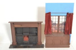 A pair of 20th Century shop display / salesmen / a