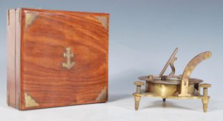 A vintage 20th Century West London desktop compass