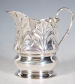 An Edwardian silver hallmarked creamer jug with ac