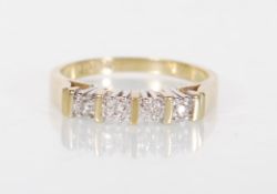 A stamped 9ct yellow gold ring having a decorative