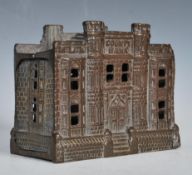 A 19th Century Victorian cast iron money box of ar
