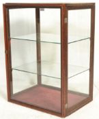 A early 20th Century oak counter-top display cabin