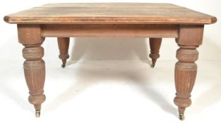 A 19th Century Victorian oak extending dining tabl