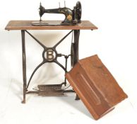 A late 19th Century treadle sewing machine table o