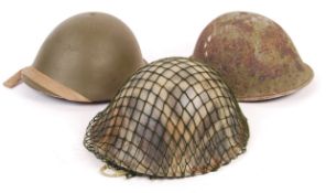 COLLECTION OF WWII BRITISH ARMY TURTLE STEEL COMBA