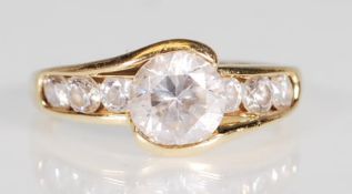 A hallmarked 14ct gold and CZ dress ring. The ring