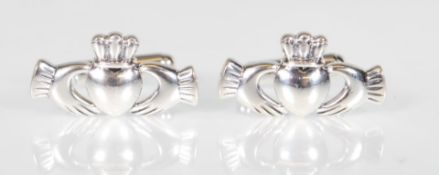 A pair of stamped 925 silver cufflinks having Iris