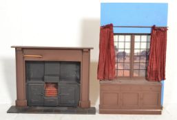 A pair of 20th Century shop display / salesmen / a