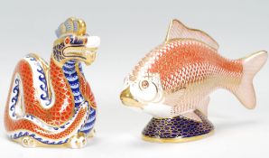 A Royal Crown Derby porcelain figurine of a Chines