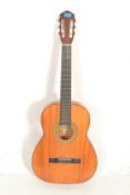 A vintage 20th Century six string acoustic six str