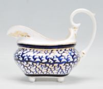 A 19th Century Crown Derby porcelain sauce boat /