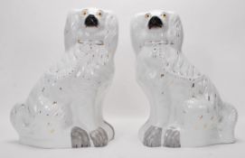 A pair of 19th Century large Staffordshire firesid