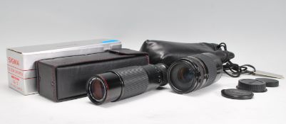 A cased and boxed Sigma VZ-2 Zoom Converter X18-X4