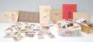A collection of cigarette cards to include full an