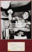 Muhammad Ali signed framed photographic presentation, a 10 by 8in.