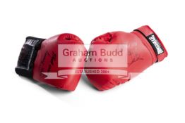 Two autographed Lennox Lewis and Joe Calzaghe boxing gloves,