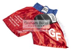 George Foreman signed trunks and Jake LaMotta signed glove,