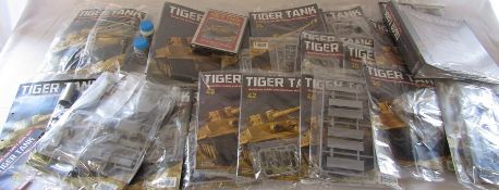 Approximately 22 build your own Tiger Tank magazines and parts by Hachette together with two folders