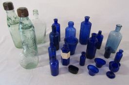 Various glass bottles inc blue poison and cod bottles, J Willatt & Co Nottingham, E Batty