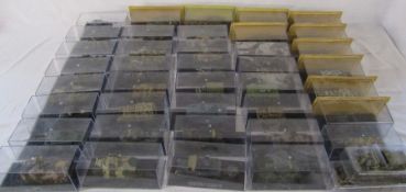 Approximately 40 cased die cast model tanks (2 boxes)
