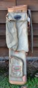 A. Bryant & Co leather and canvass small green oval golf club bag - c/w to leather club dividers,