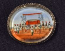 Indian Miniature Painting Brooch depicts a ceremonial scene, within decorative white metal frame,